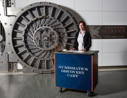 The Discovery Cart outside of the new exhibit of the Smithsonian National Numismatic Collection. Photo courtesy NGC